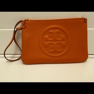 Tory Burch Perry Bomb Pebbled leather wristlet- orange